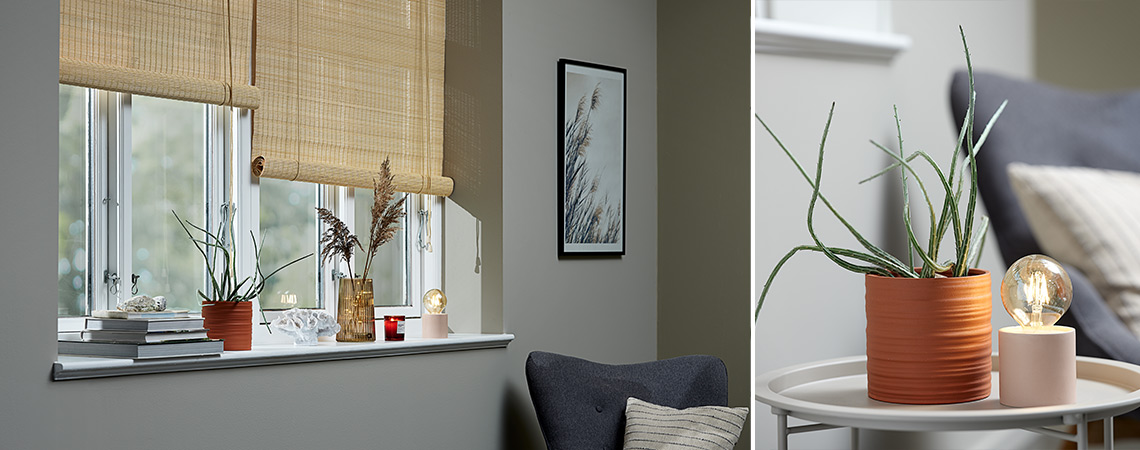 Windowsill décor consisting of a plant pot, an ornament, a vase, a scented candle and a battery lamp