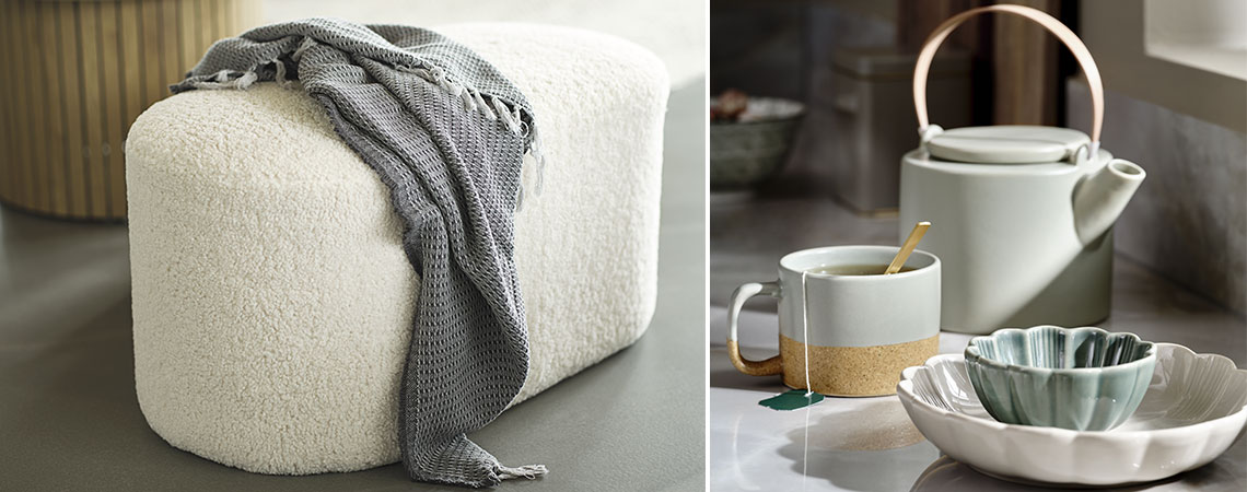 White pouffe with throw and teapot, mug and bowls 