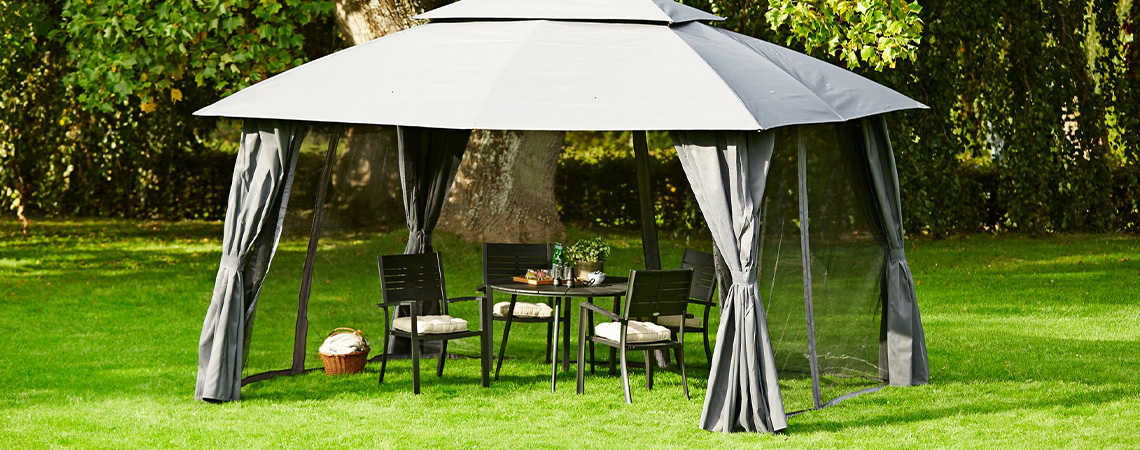 SANKT HANS gazebo with sides Grey gazebo with dining table and chairs on lawn in garden