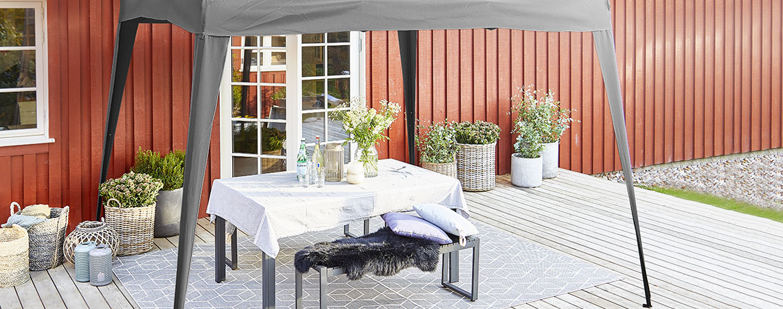 JERUP gazebo with SAUNTE bench and SANSEBIE garden planters Outdoor gazebo on a patio