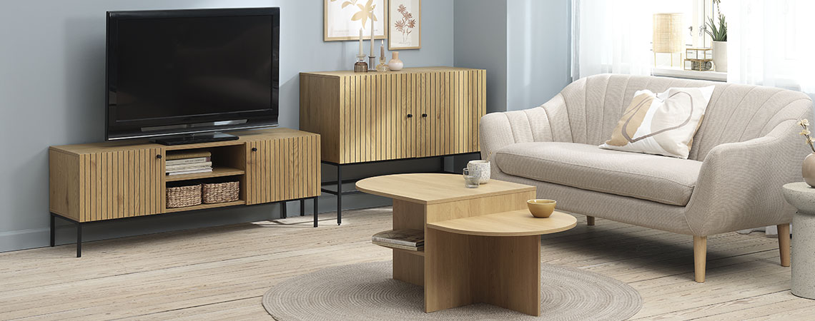 HEMDRUP TV bench, EGEDAL sofa and LISBJERG coffee table TV bench with a TV in a living room with sofa, coffee table and sideboard