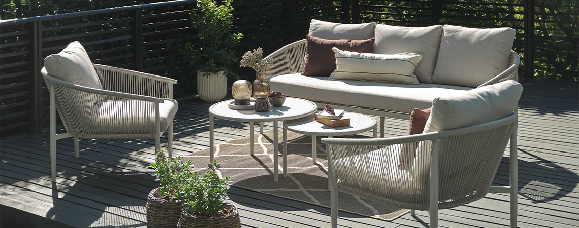 Check out some of the garden trends of the season in this blog post Bright beige outdoor lounge set on a patio