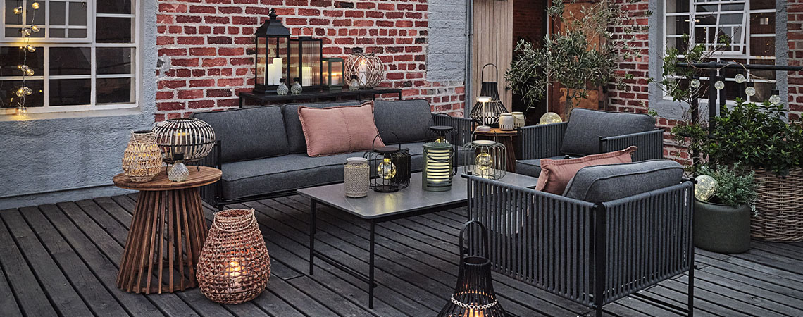Light up your outdoor space with different kinds of outdoor lights Different kinds of solar garden lights, outdoor lanterns, and solar garden lights on patio