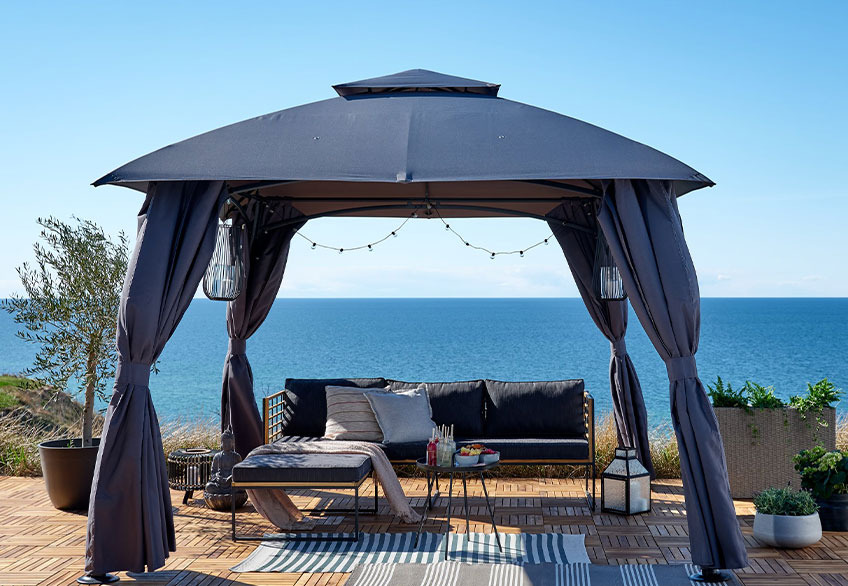 SANKT HANS gazebo Outdoor gazebo on a patio by the ocean