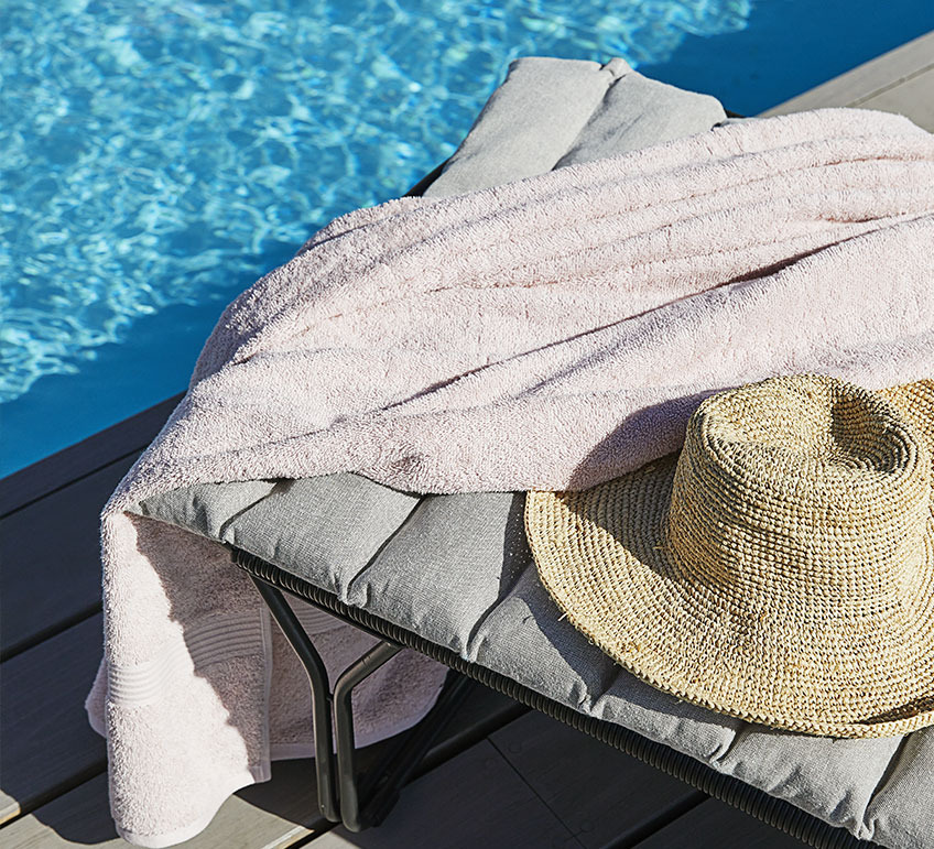 STOREHOLM cushion on UBBERUP sun lounger Sun lounger with cushion by a swimming pool