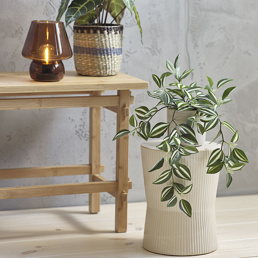 ASGAR artificial plant in RAYMOND plant pot on top of SIGMUND pedestal Artificial plant in plant pot on top of white ribbed pedestal