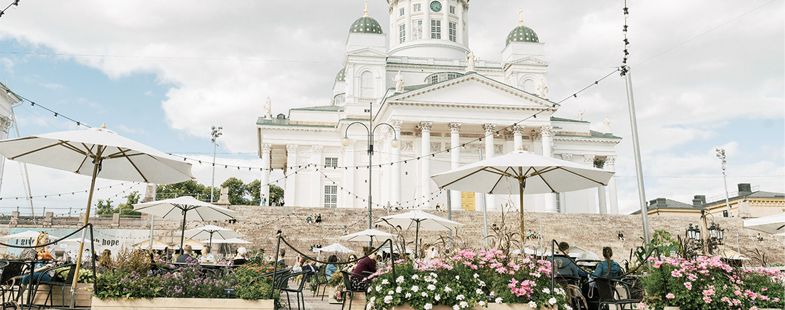 Stackable chairs and tables on Senate Square Torikottelei in Helsinki - outdoor area