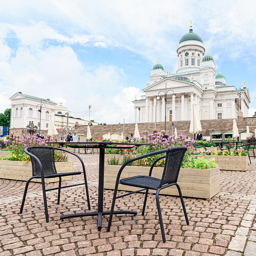 GRENAA stackable chair and garden table Senate Square equipped with garden furniture