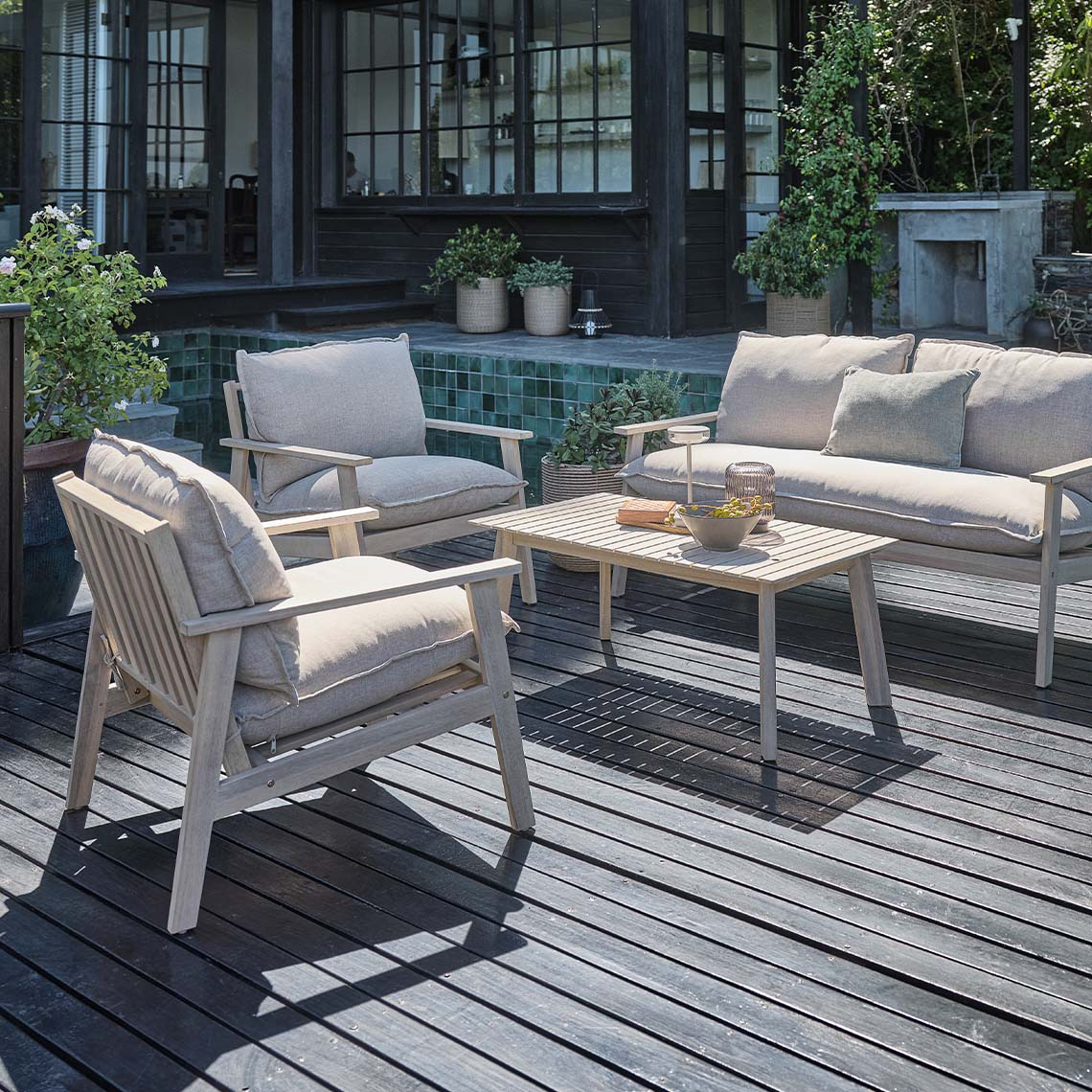 SYLTHOLM garden lounge set made from FSC®-certified, solid acacia hardwood Garden lounge set with sofa, two lounge chairs, and lounge table made from white-oiled solid acacia