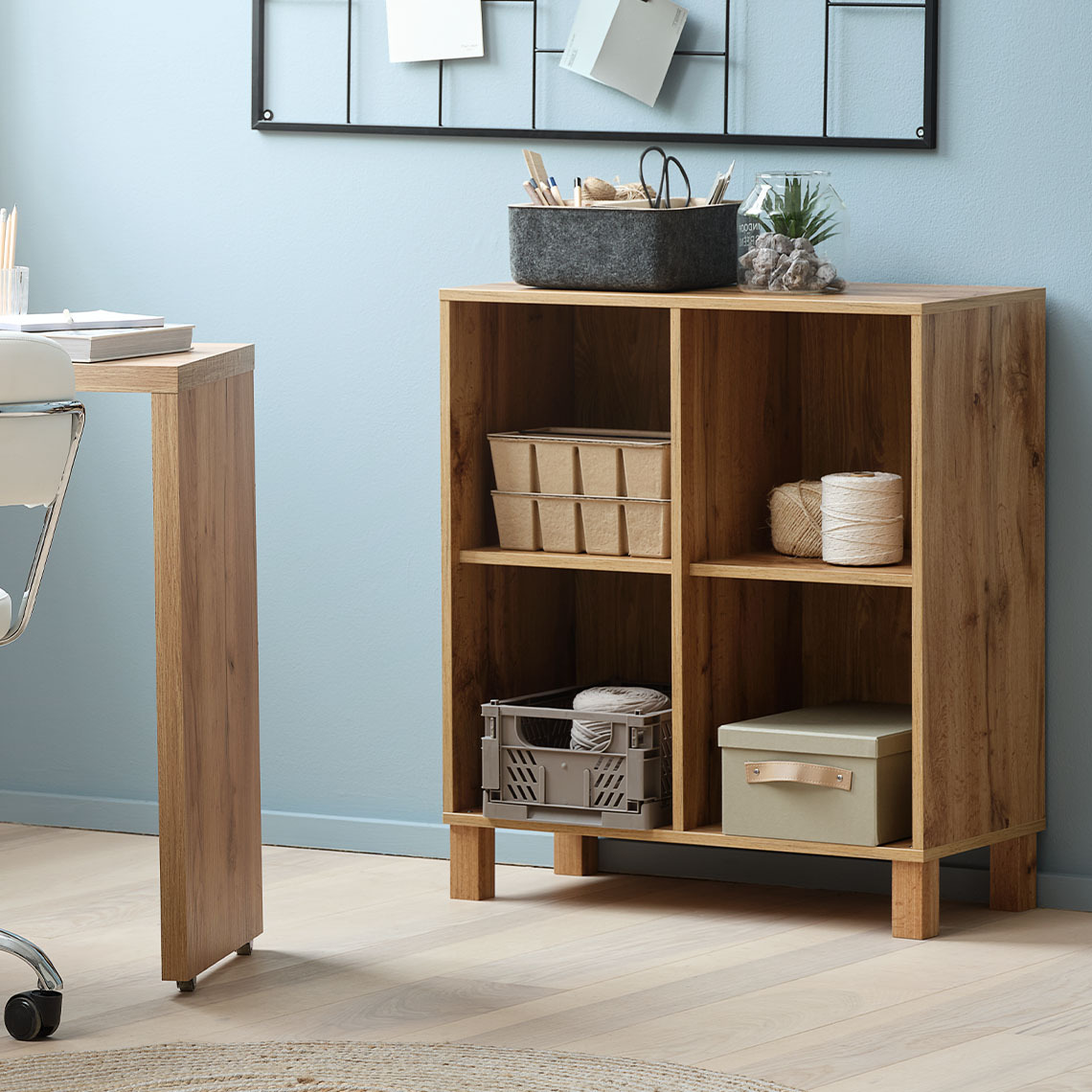 SKALS wall unit module with 4 compartments Modular wall storage unit component with four compartments, standing on floor with matching legs