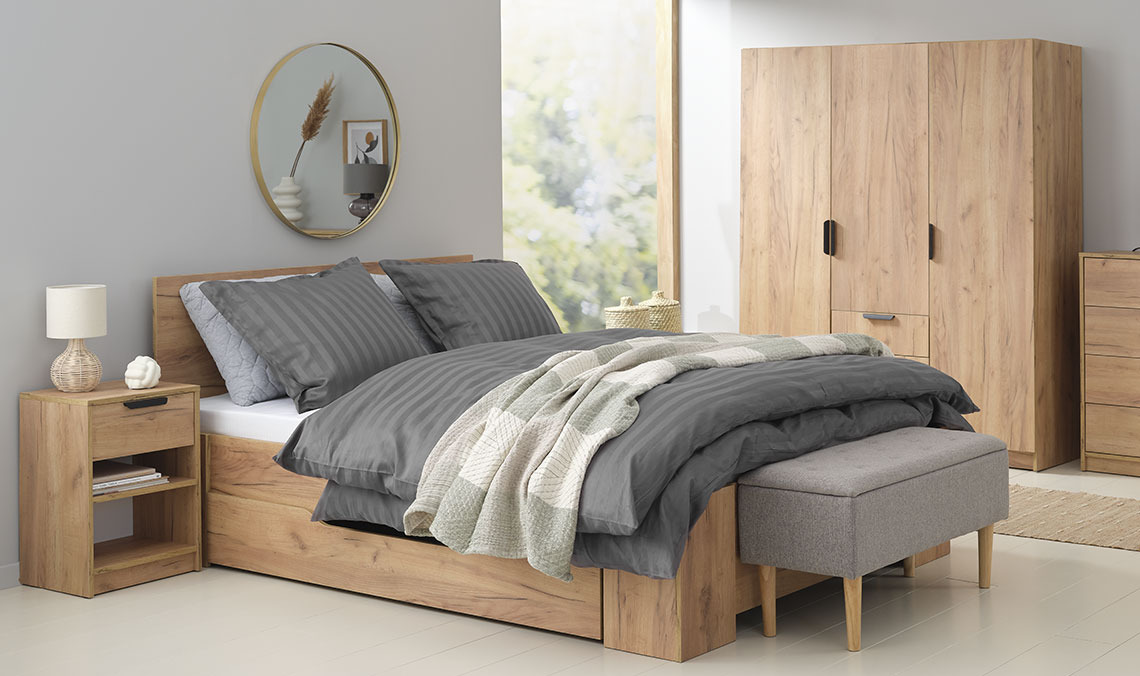 BADSTED bench provides a comfortable spot to take off shoes and clothes and doubles as a storage solution Bedroom with double bed, wardrobe, bedroom table and bench