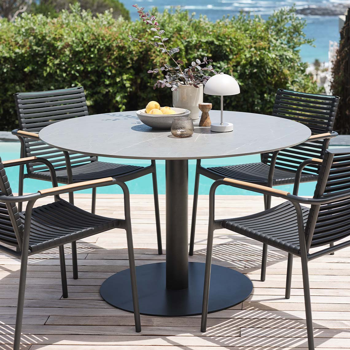 VAMDRUP garden table with fibre cement top and NABE garden chairs Fibre cement table top garden table and garden chairs