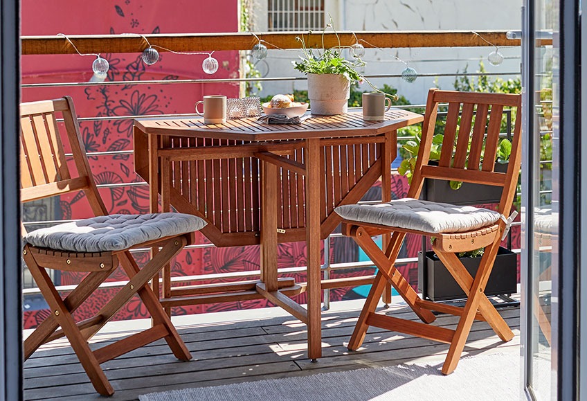 BEVTOFT folding table and VEN folding chairs Wooden garden bistro set on balcony