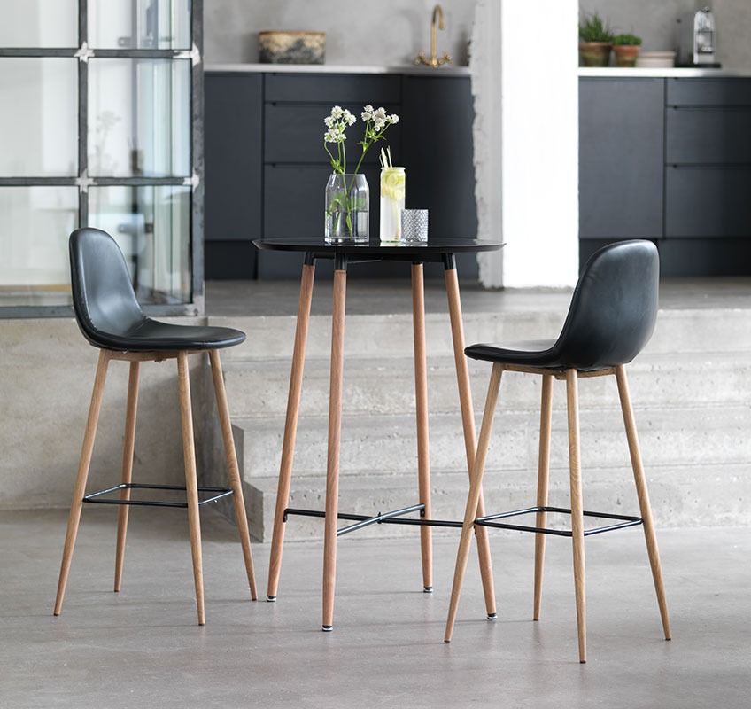 JONSTRUP bar stool and table in black faux leather and legs in oak A set of bar stools and table in black and oak