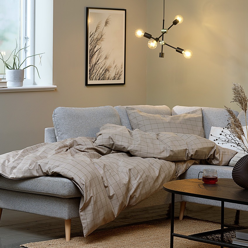AARHUS open-end sofa, duvet in TANJA duvet cover set and TORSTEIN pendant Living room “hygge” with big corner sofa, duvet and lighting