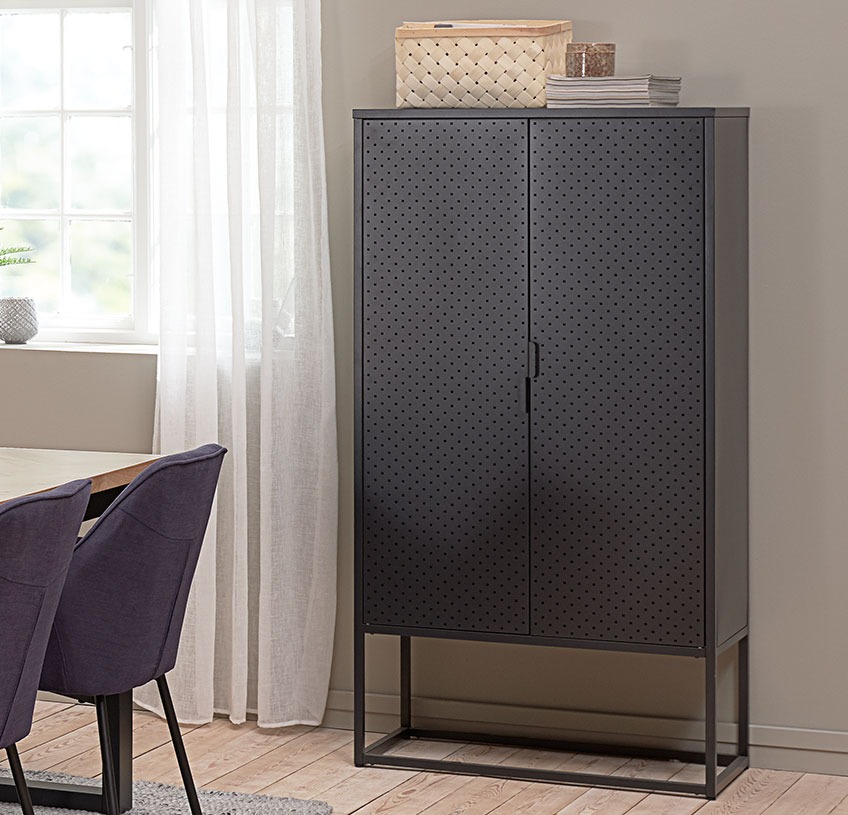 VIRUM cabinet with two doors Black cabinet in metal against a wall in a dining room